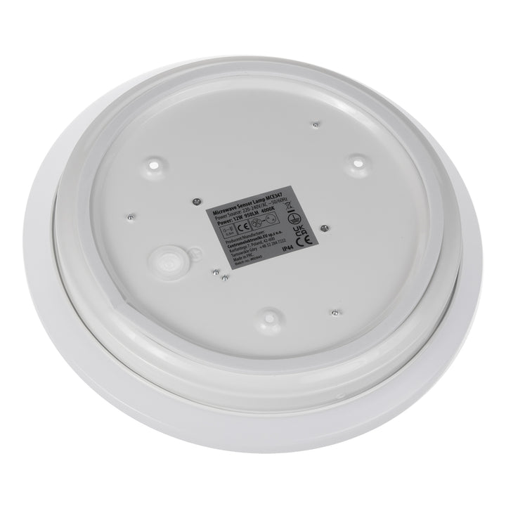 Maclean MCE347 ceiling LED sensor lamp. Equipped with a 5.8GHz microwave sensor, it emits a 4000K light with 12W power and 950lm brightness. With an IP44 rating, it ensures durability and reliability in various environments.