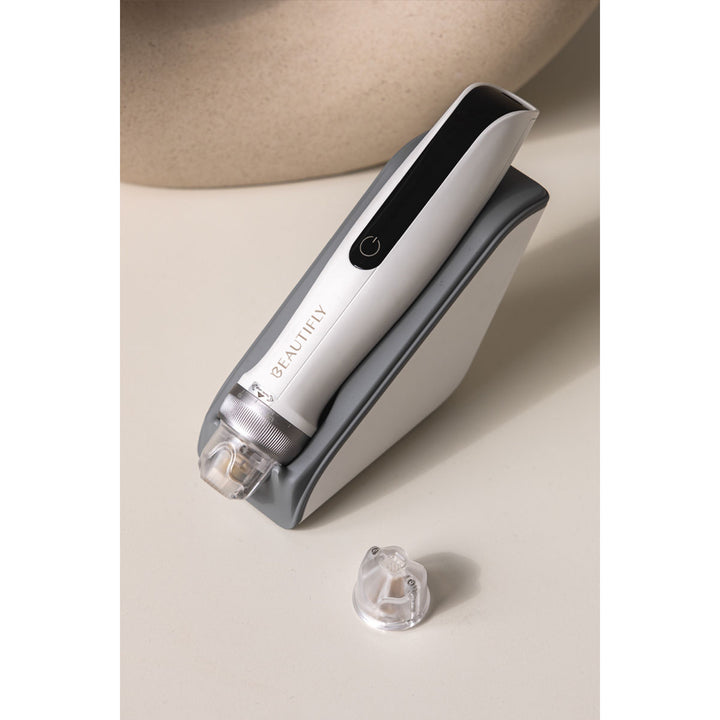 Dermapen CollagenBoost Microneedle Mesotherapy with EMS microcurrents and LED light.