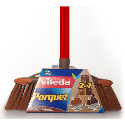 Brosse Vileda avec deux tailles de poils différentes : une pour balayer les cheveux et les peluches et une seconde pour balayer la poussière.